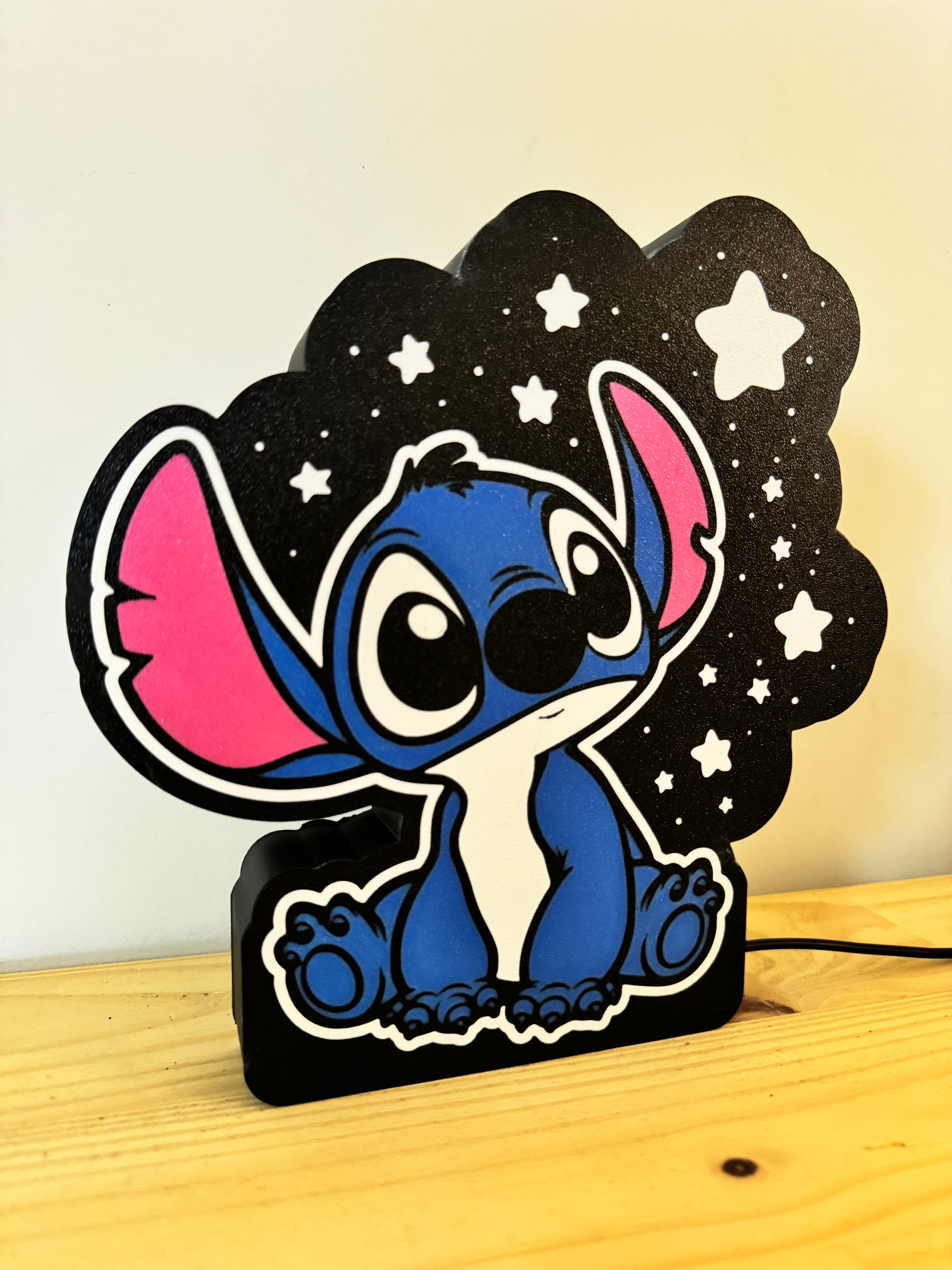 Lampe LED Stitch avec étoiles blanches
