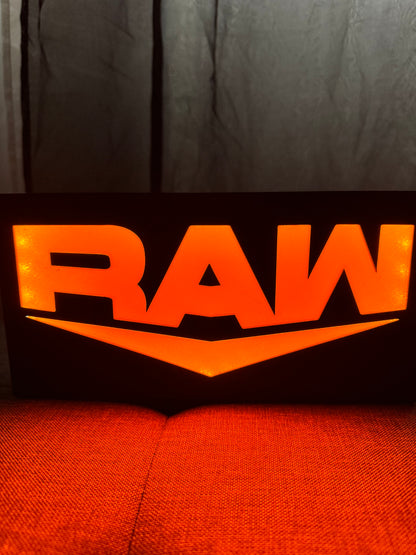 Lampe LED WWE RAW fond noir
